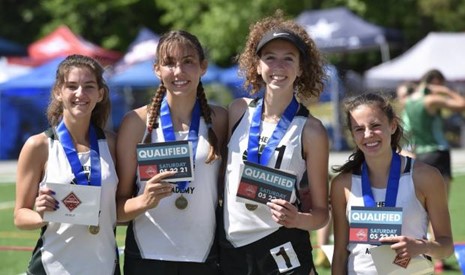 Photo of Girls 4X800 Relay Team Winning First at State. Photo from Davis McLanahan.

