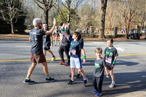 Family and friends congratulate each other for finishing the Spartan 5K.