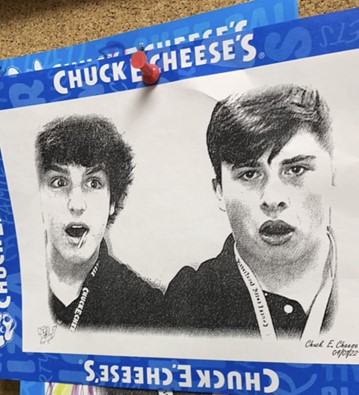 AJ Chambers and Patrick Rodrigue photographed by the Chuck E Cheese game “Sketch Book”